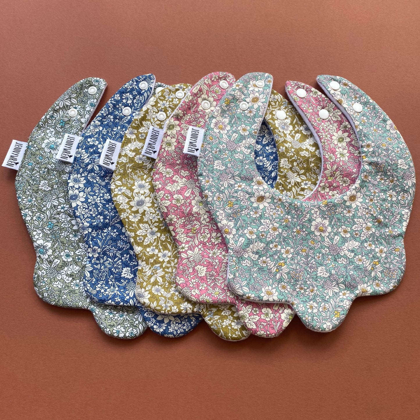 Choice of floral scallop bib
