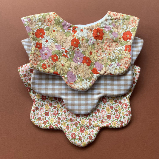 Choice of floral scallop bibs