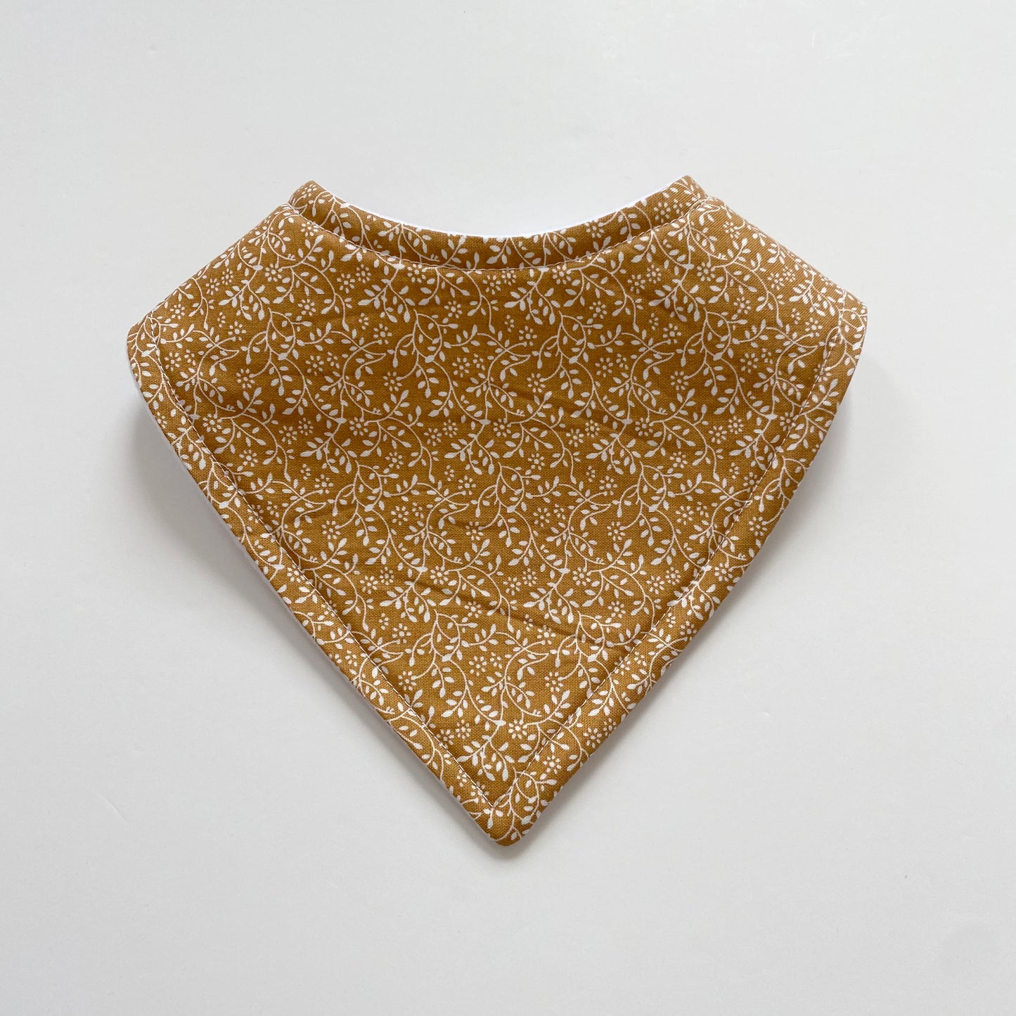 Mustard ditsy bandana bib
