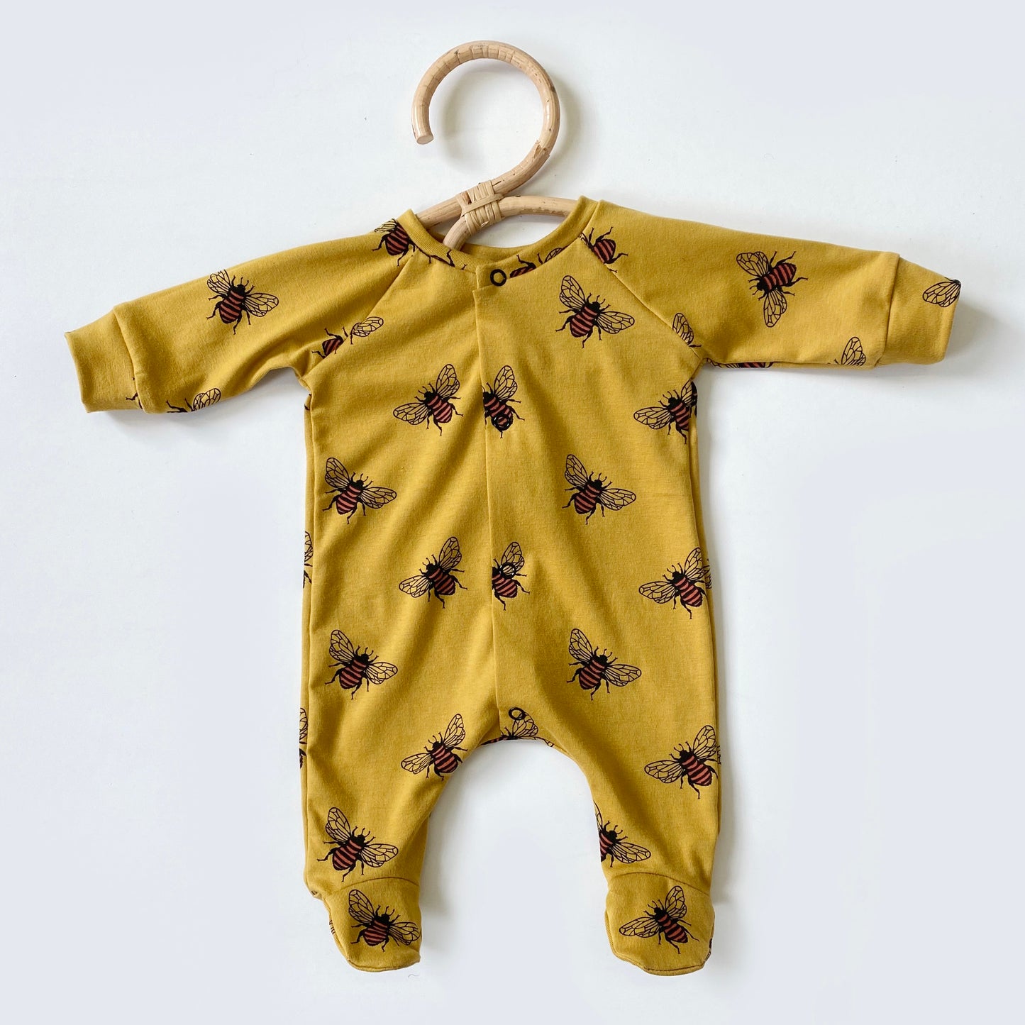 Mustard bee footed babygrow