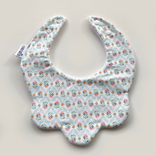 Turquoise and pink floral scallop bib