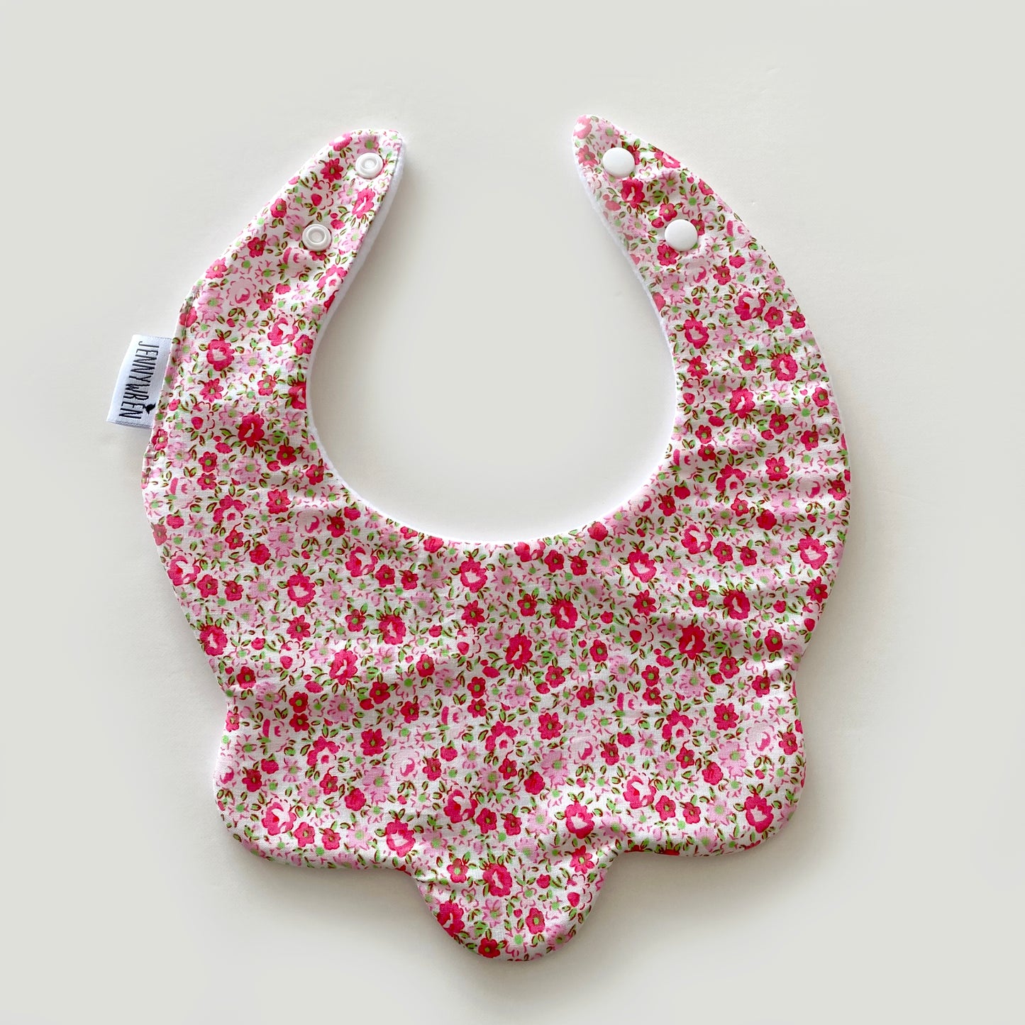 Pink with green ditsy floral scallop bib