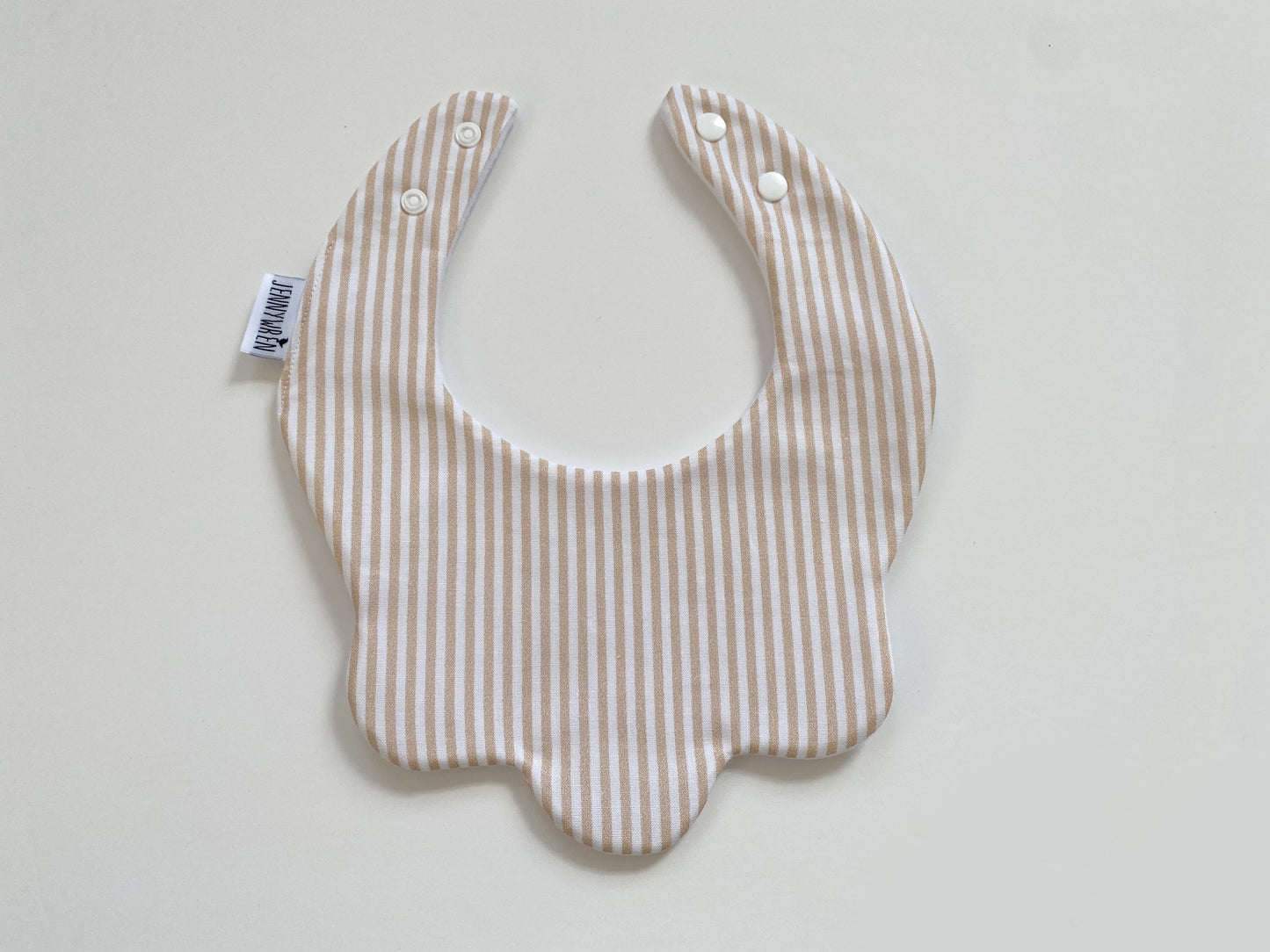Beige stripe scallop bib
