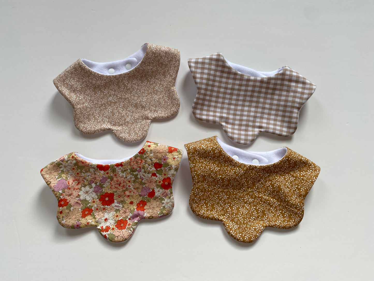 Choice of ditsy scallop bib