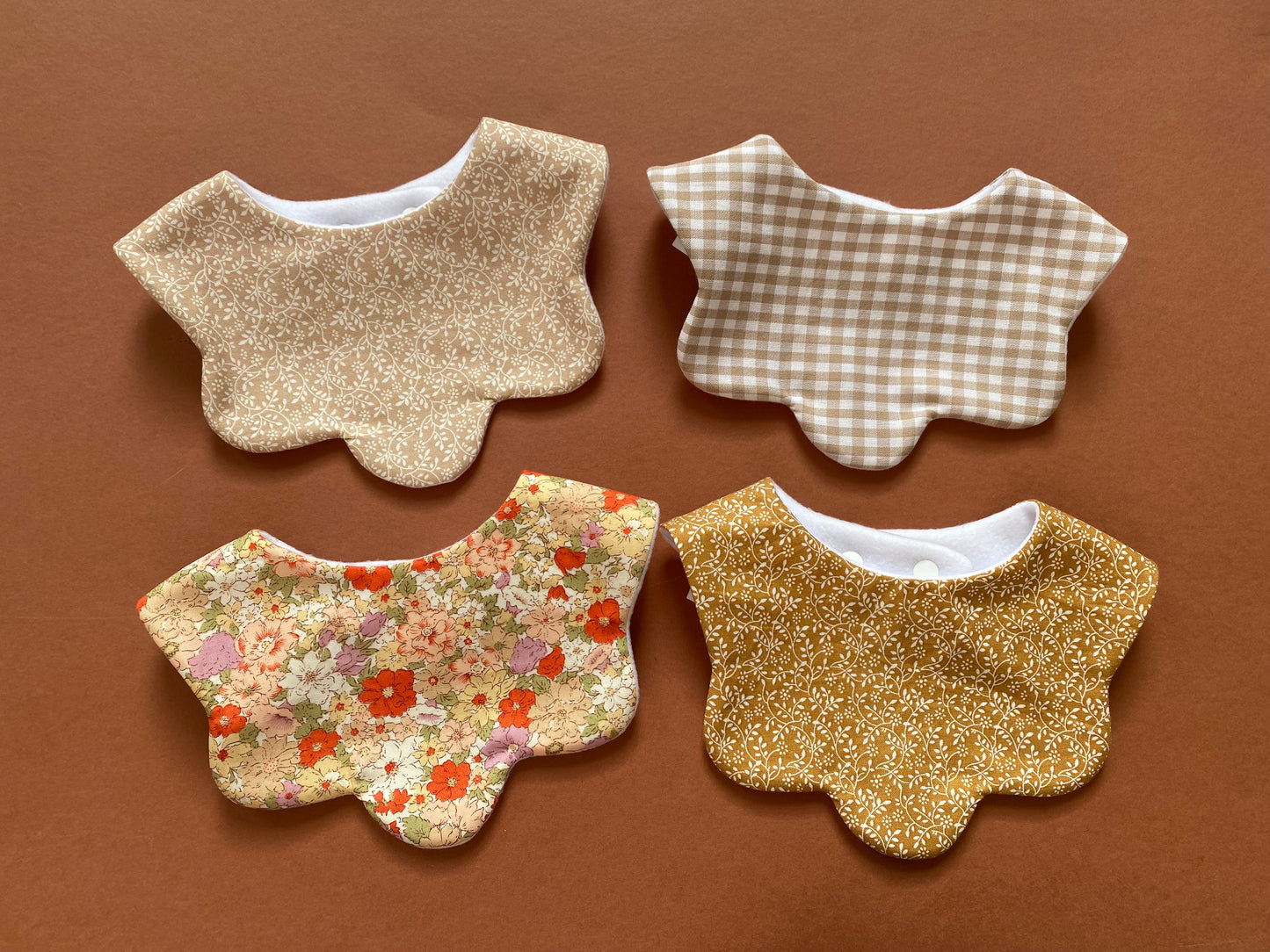 Choice of ditsy scallop bib