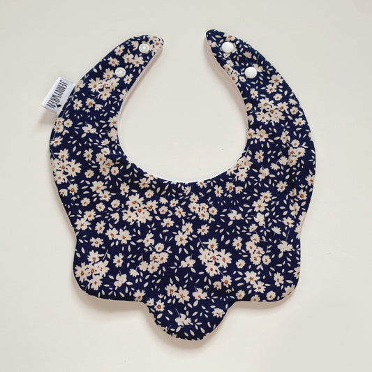 Navy blue floral scallop bib