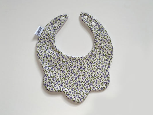 Cream with purple flowers scallop bib