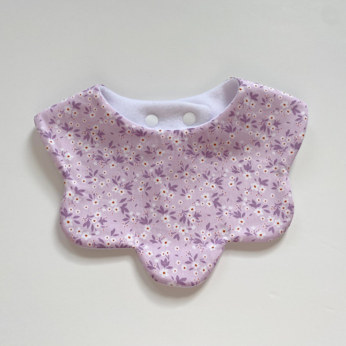 Lilac ditsy floral scallop bib