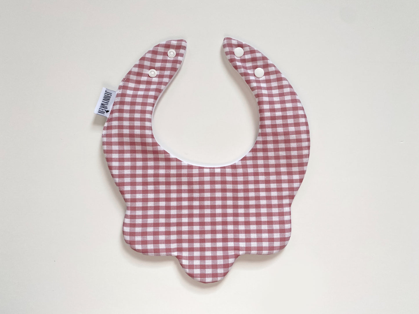 Dusky pink gingham scallop bib