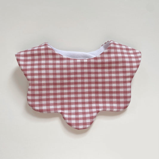 Dusky pink gingham scallop bib