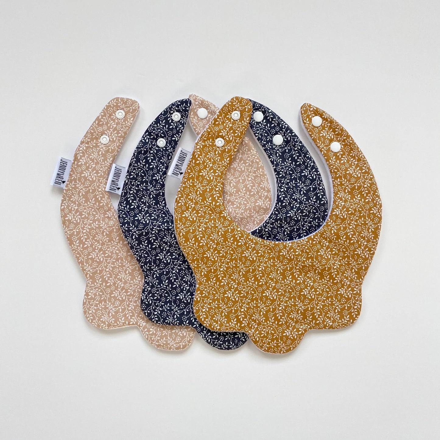 Choice of Autumn ditsy scallop bib