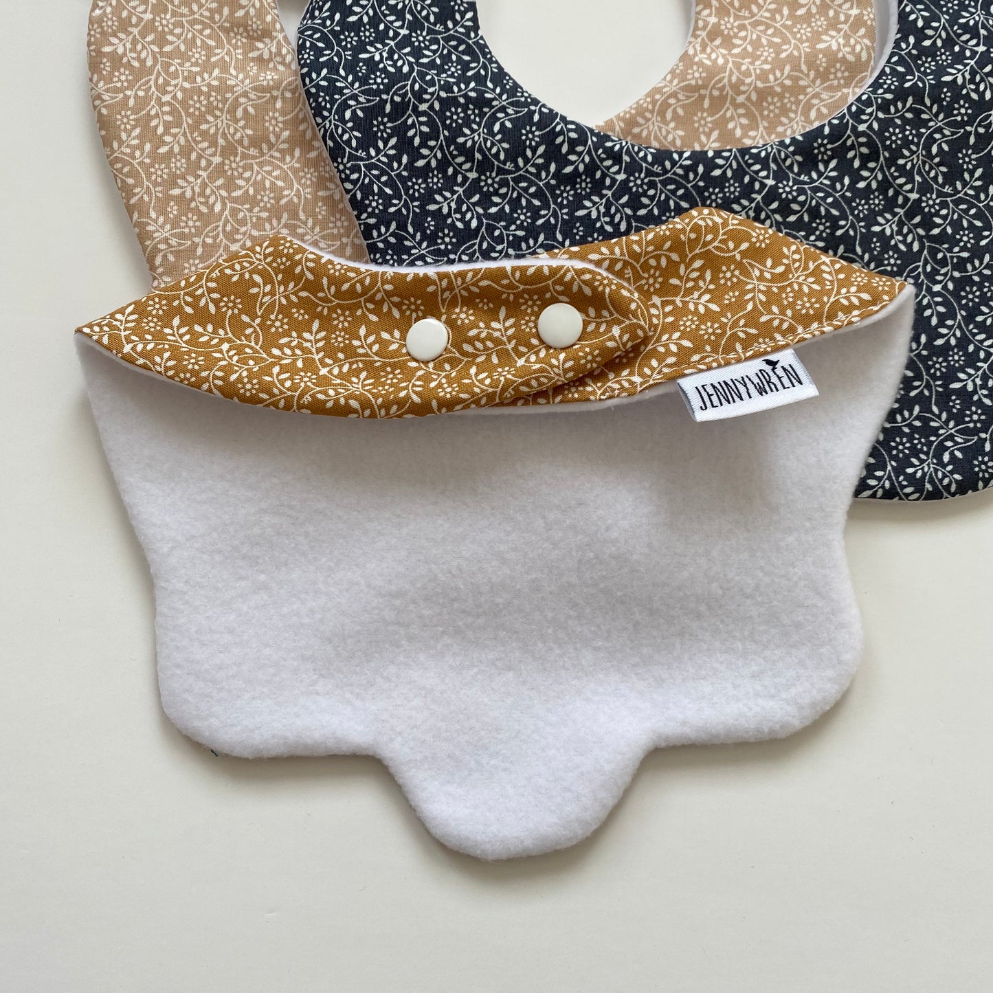 Choice of Autumn ditsy scallop bib