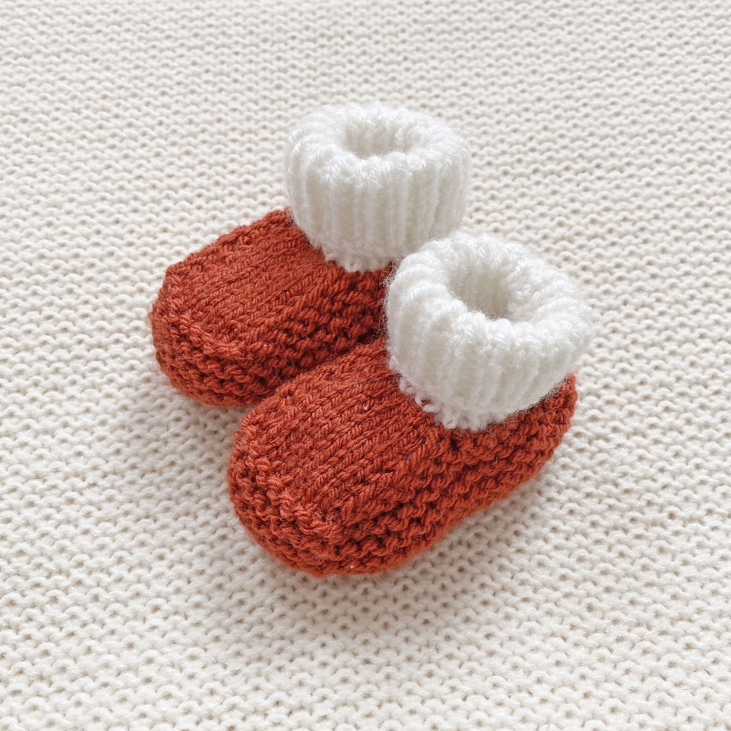 Knitted booties copper