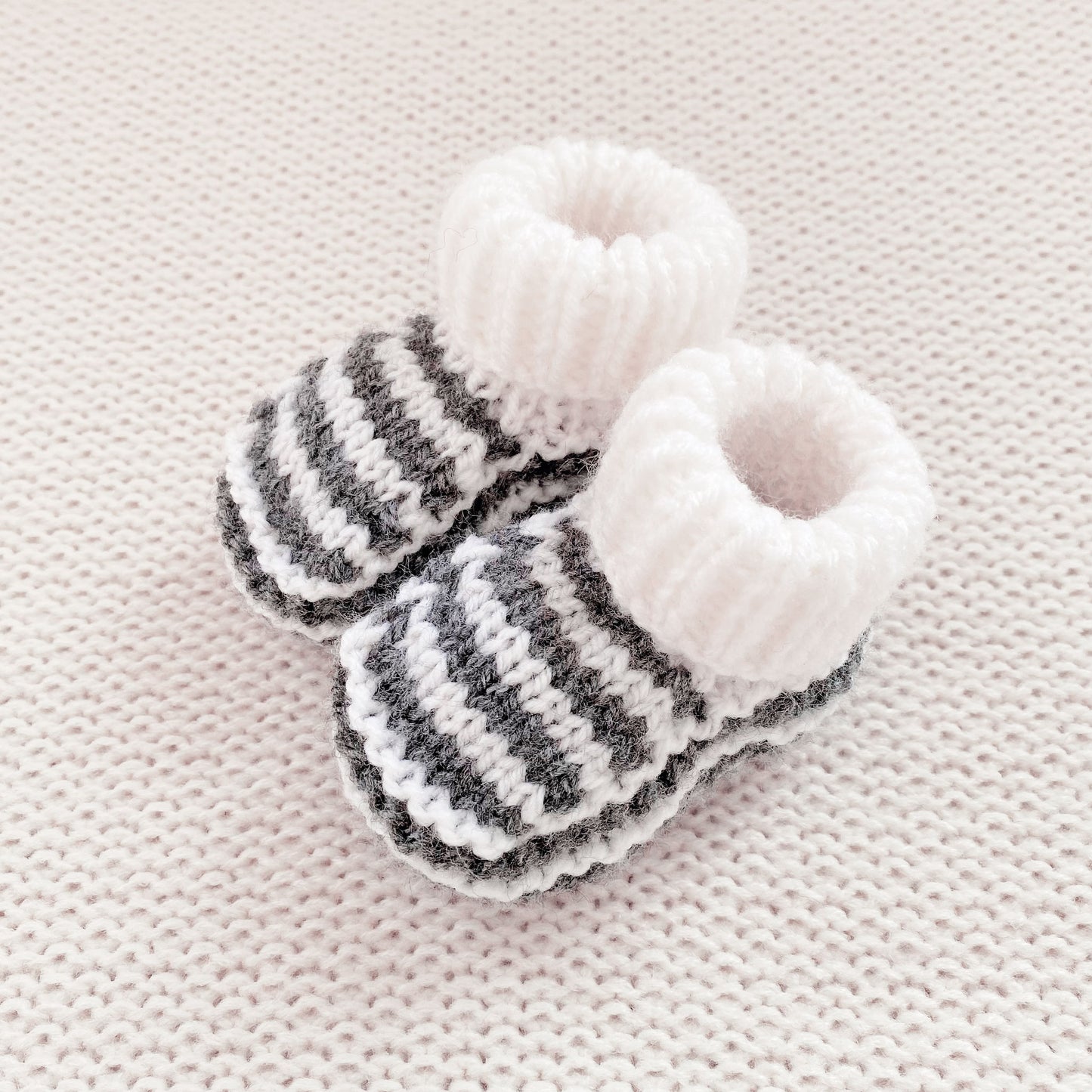 Knitted booties dark grey stripe