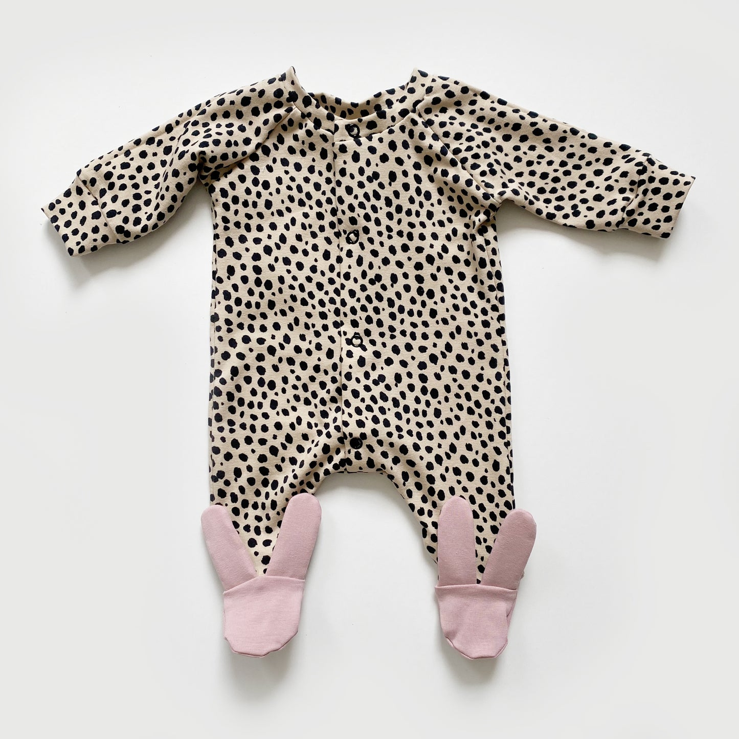 Sand dalmatian dusky pink bunny footed babygrow