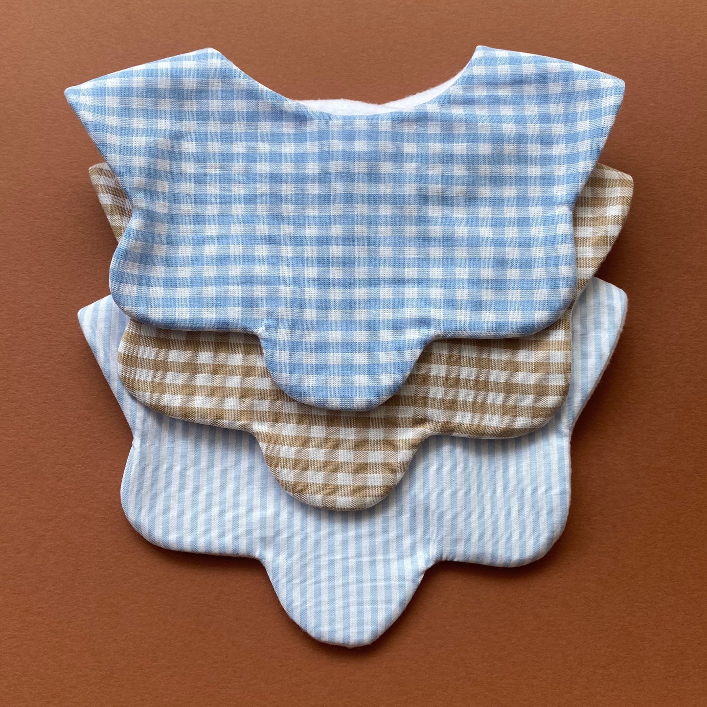 Choice of gingham stripe scallop bib