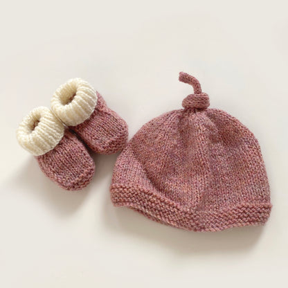0-3 months dusky pink hand-knitted knot hat and booties set