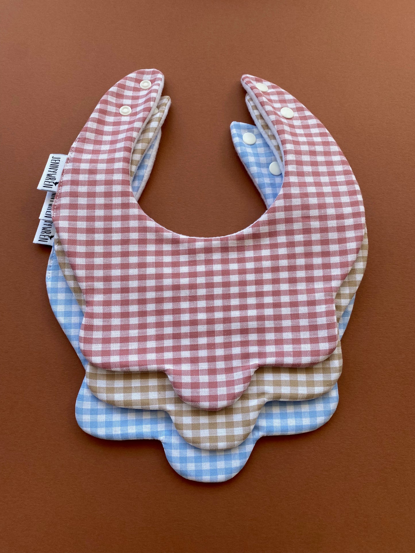 Choice of gingham scallop bib