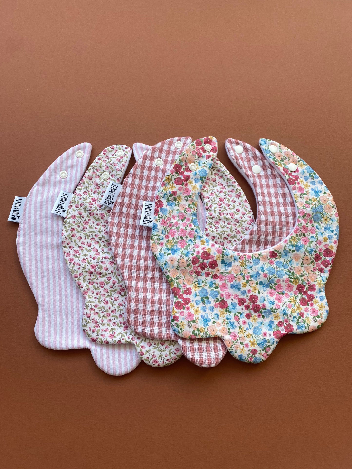 Choice of floral scallop bibs