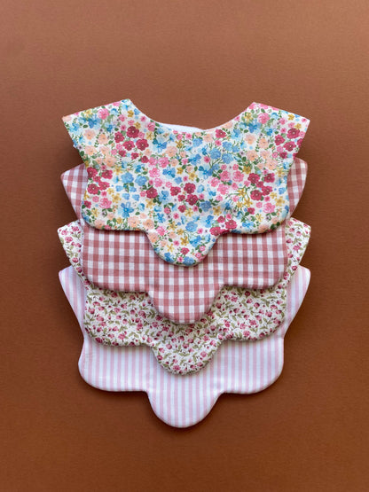 Choice of floral scallop bibs