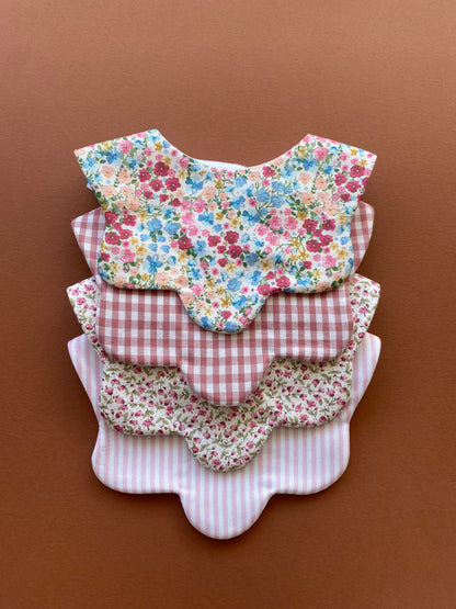 Choice of floral scallop bibs