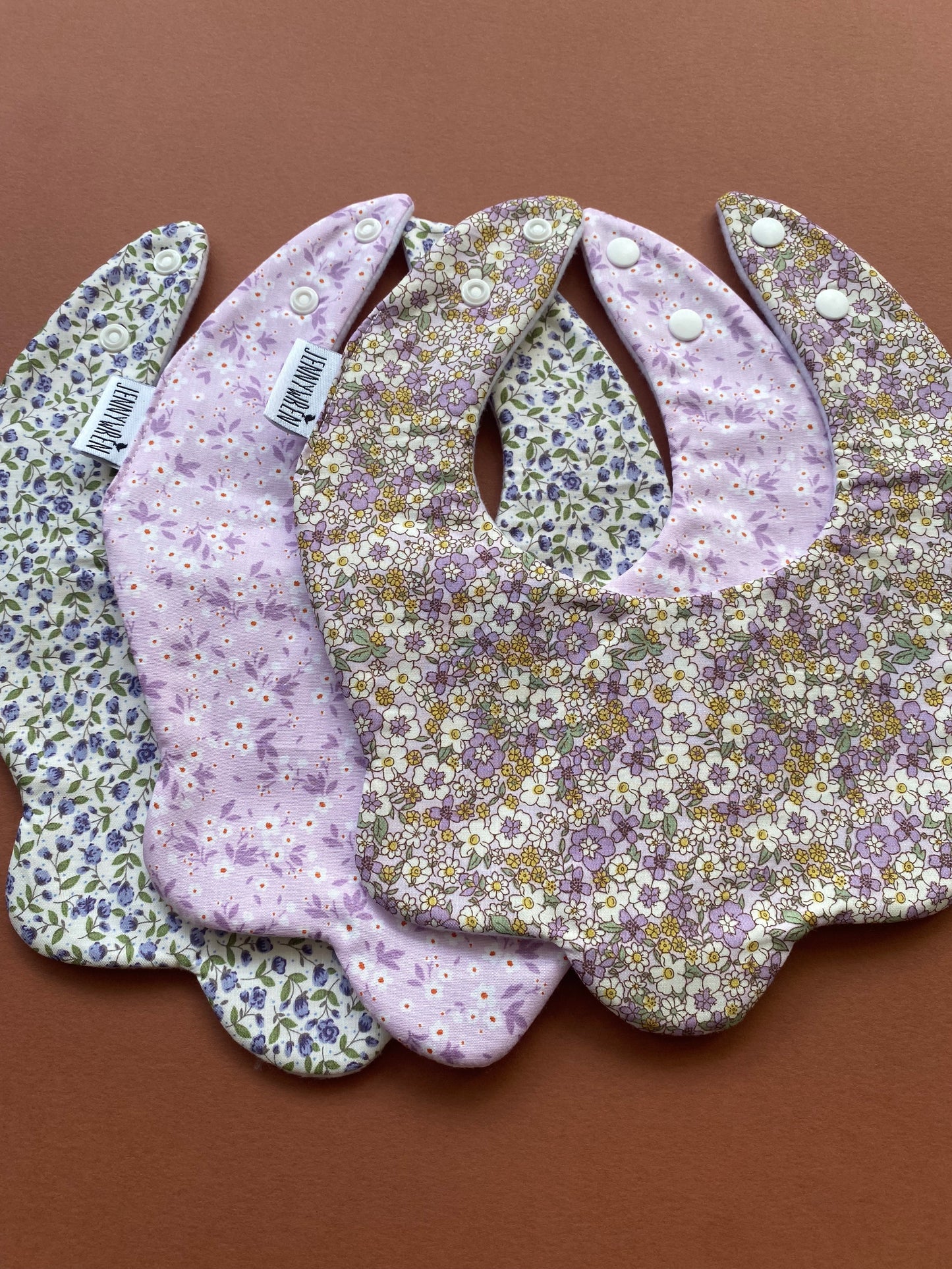 Choice of floral scallop bibs