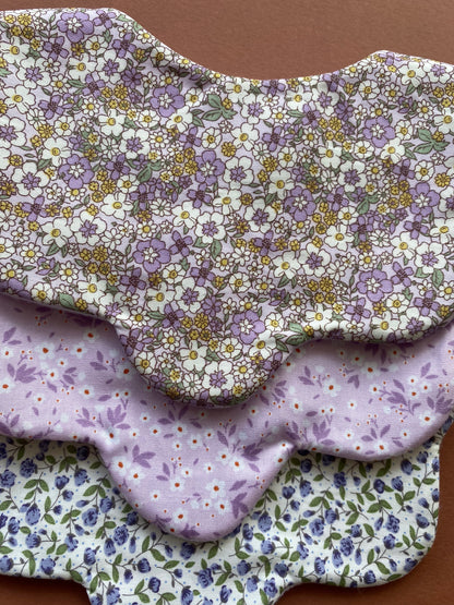 Choice of floral scallop bibs