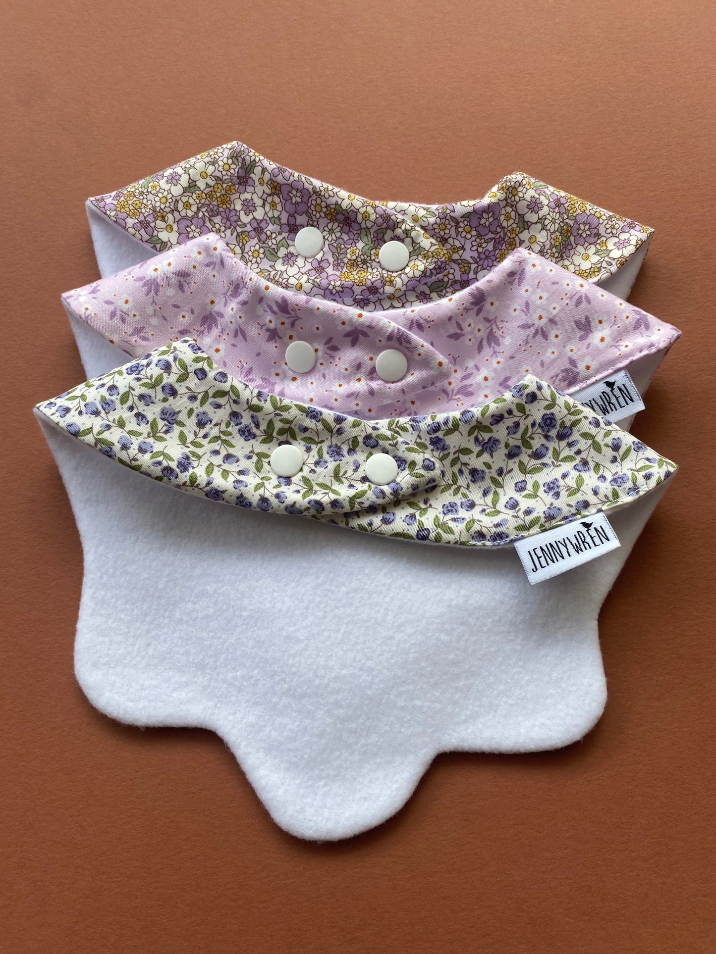 Choice of floral scallop bibs