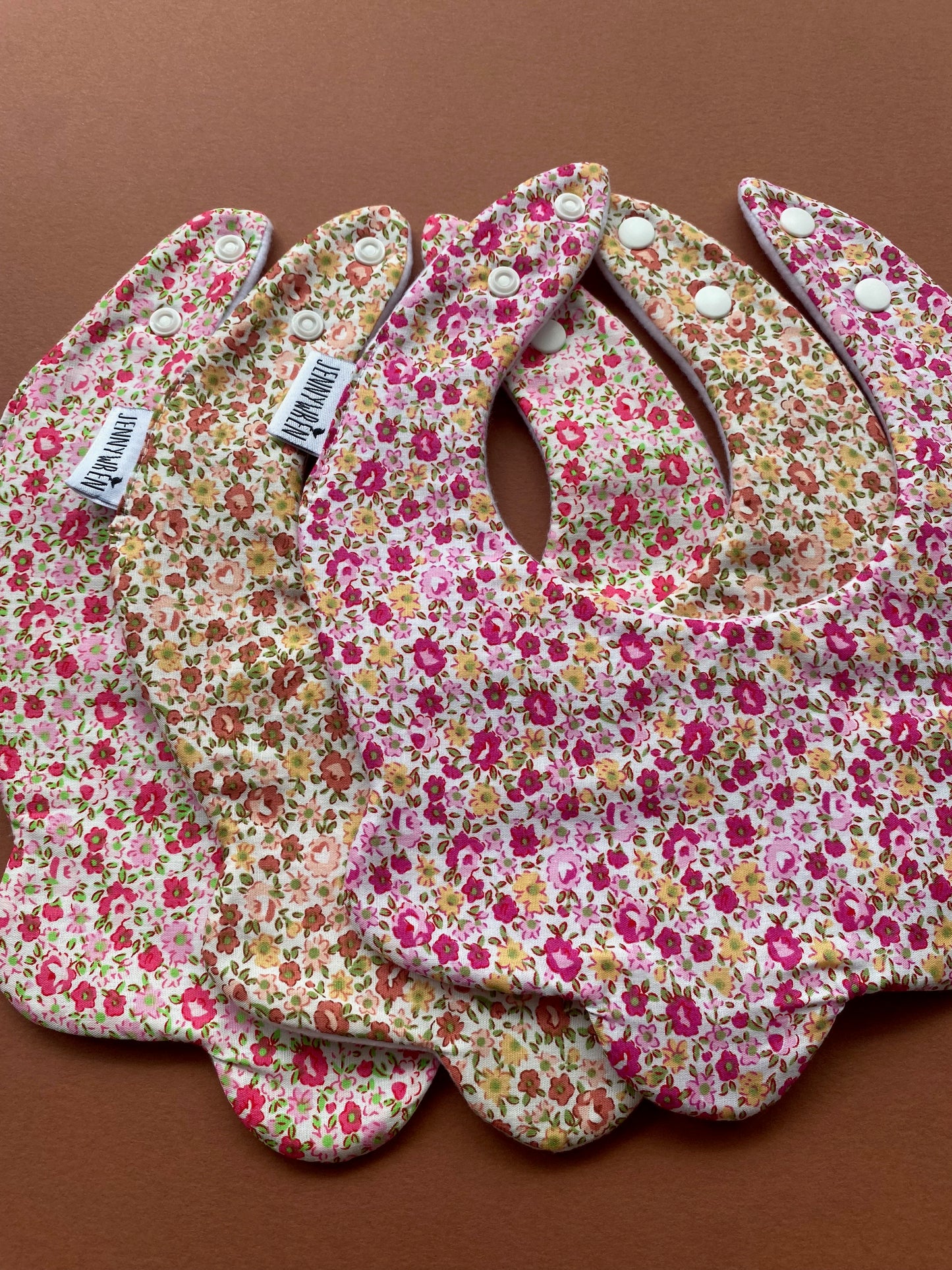 Choice of floral scallop bibs