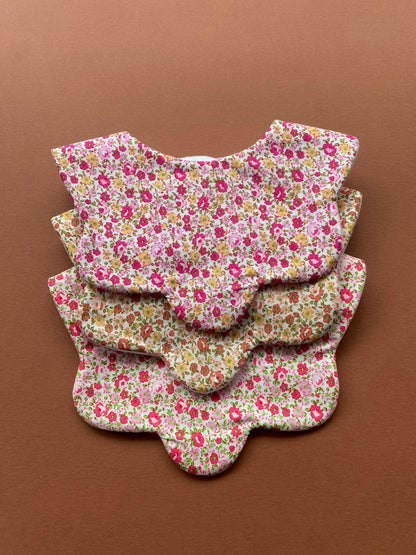 Choice of floral scallop bibs