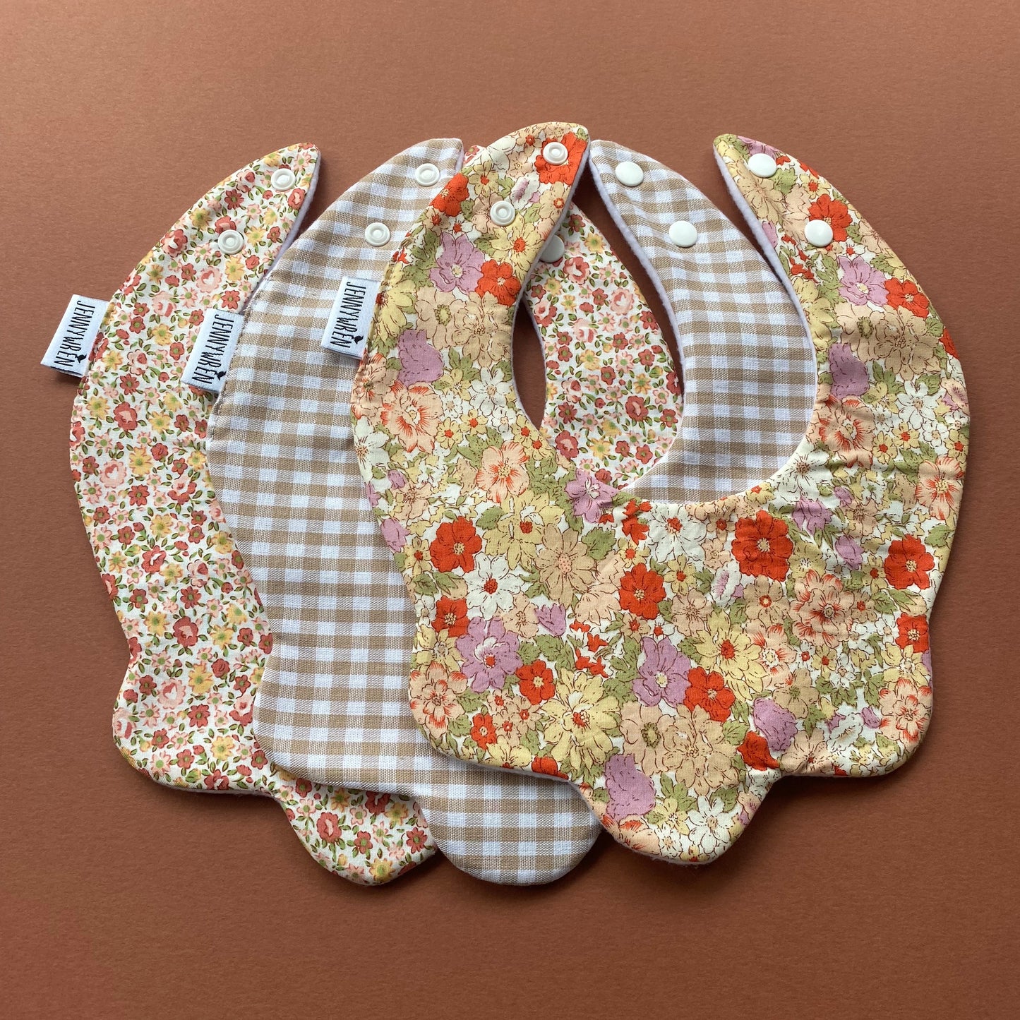 Choice of floral scallop bibs