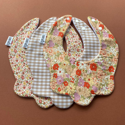 Choice of floral scallop bibs