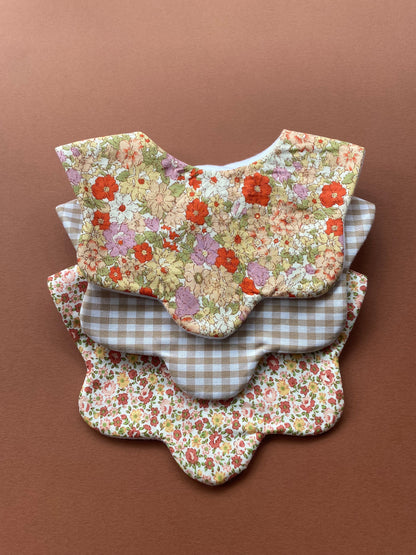 Choice of floral scallop bibs