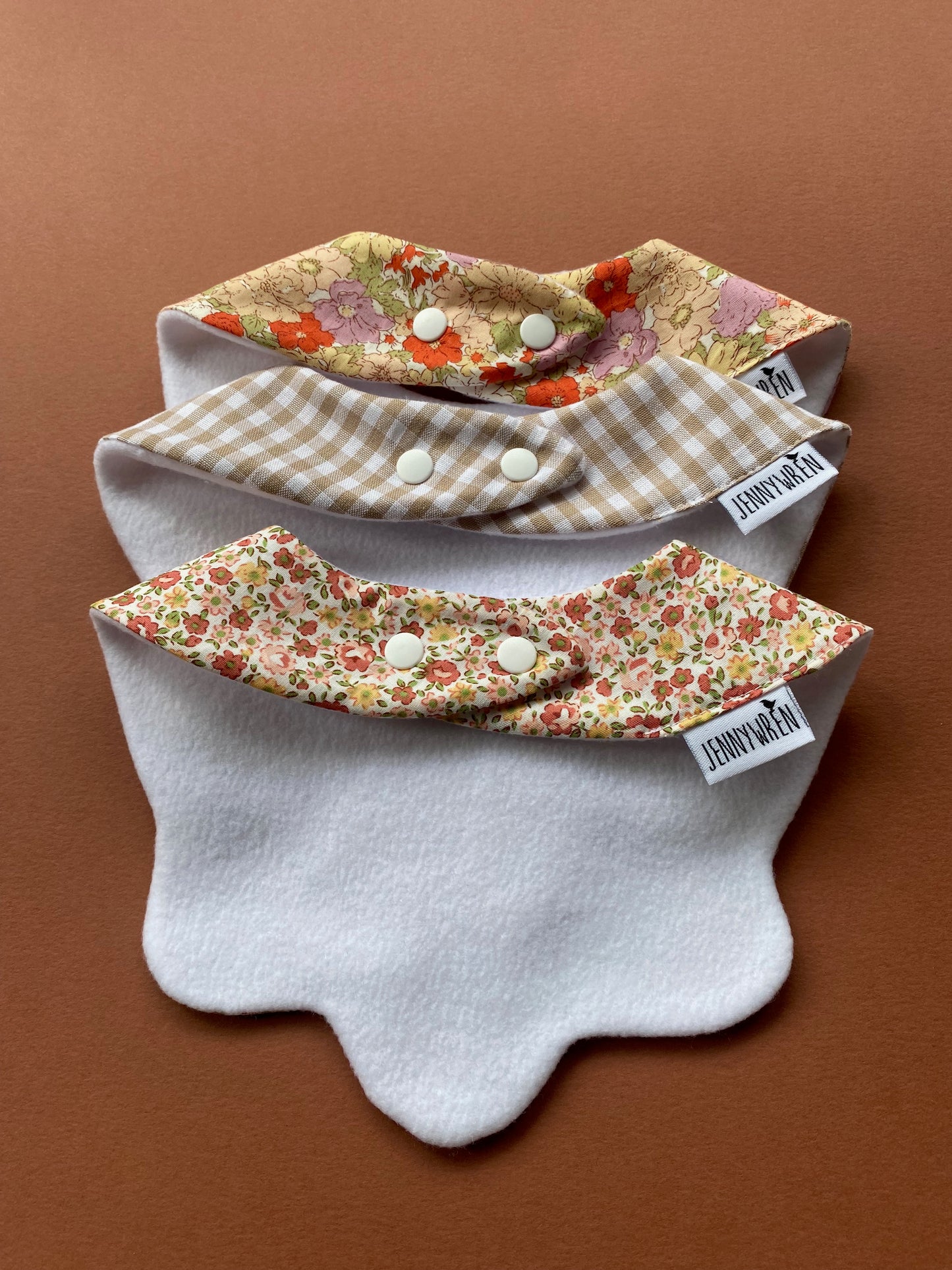 Choice of floral scallop bibs