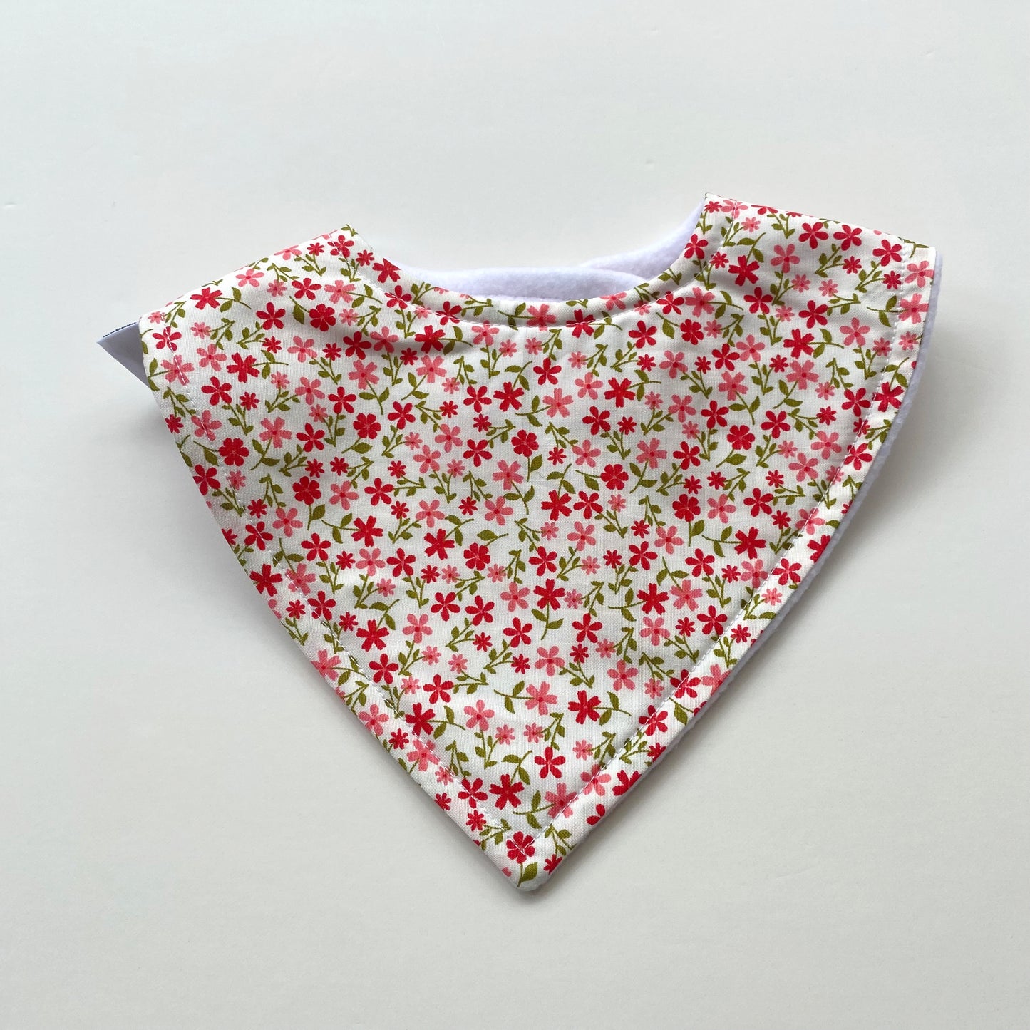Red coral ditsy on cream bandana bib