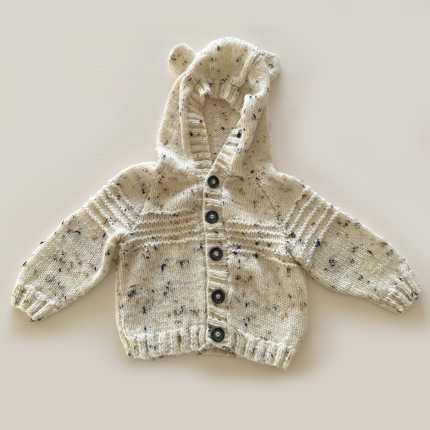 6-12M mottled cream hand-knitted cardigan with bear hood - new