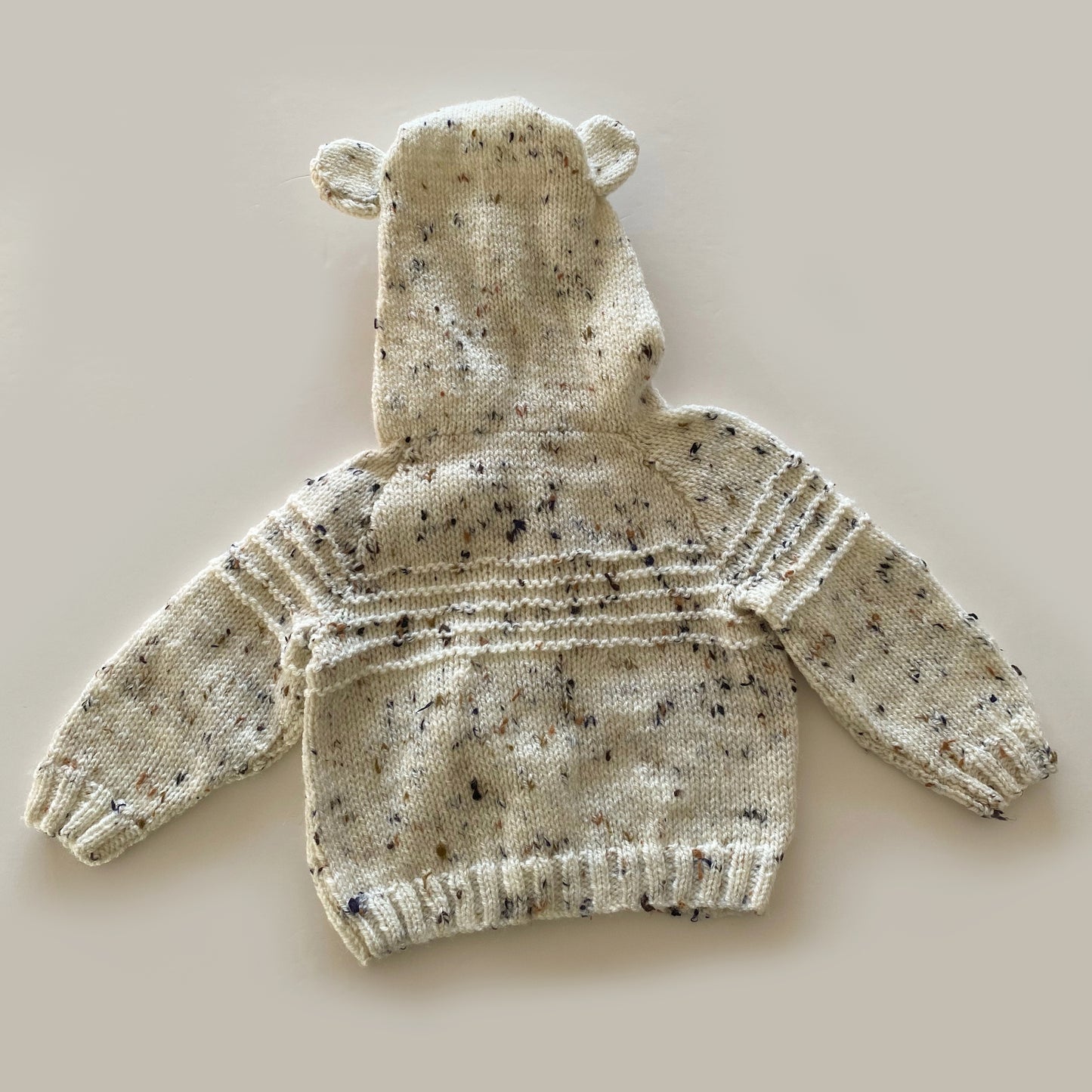 6-12M mottled cream hand-knitted cardigan with bear hood - new