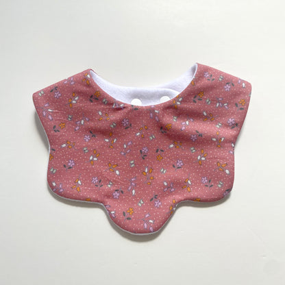 Pink ditsy scallop bib