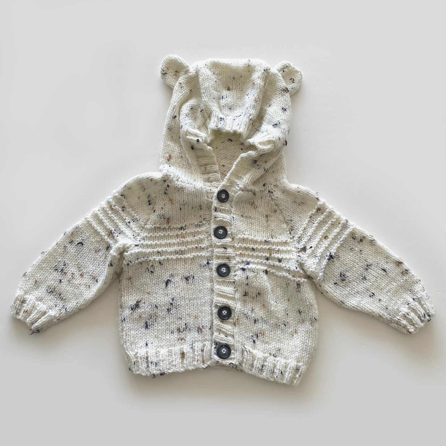 6-12M mottled cream hand-knitted cardigan with bear hood