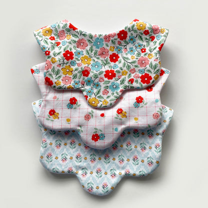 Choice of floral scallop bib