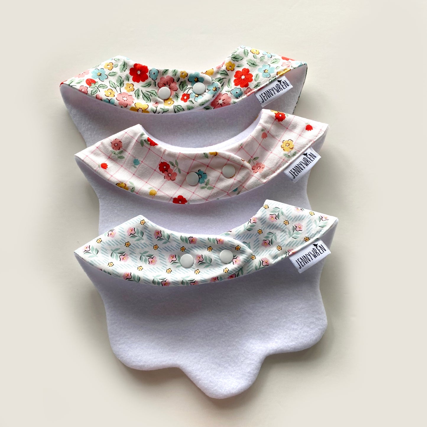Choice of floral scallop bib