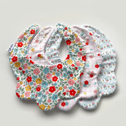 Choice of floral scallop bib