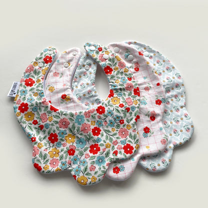 Choice of floral scallop bib