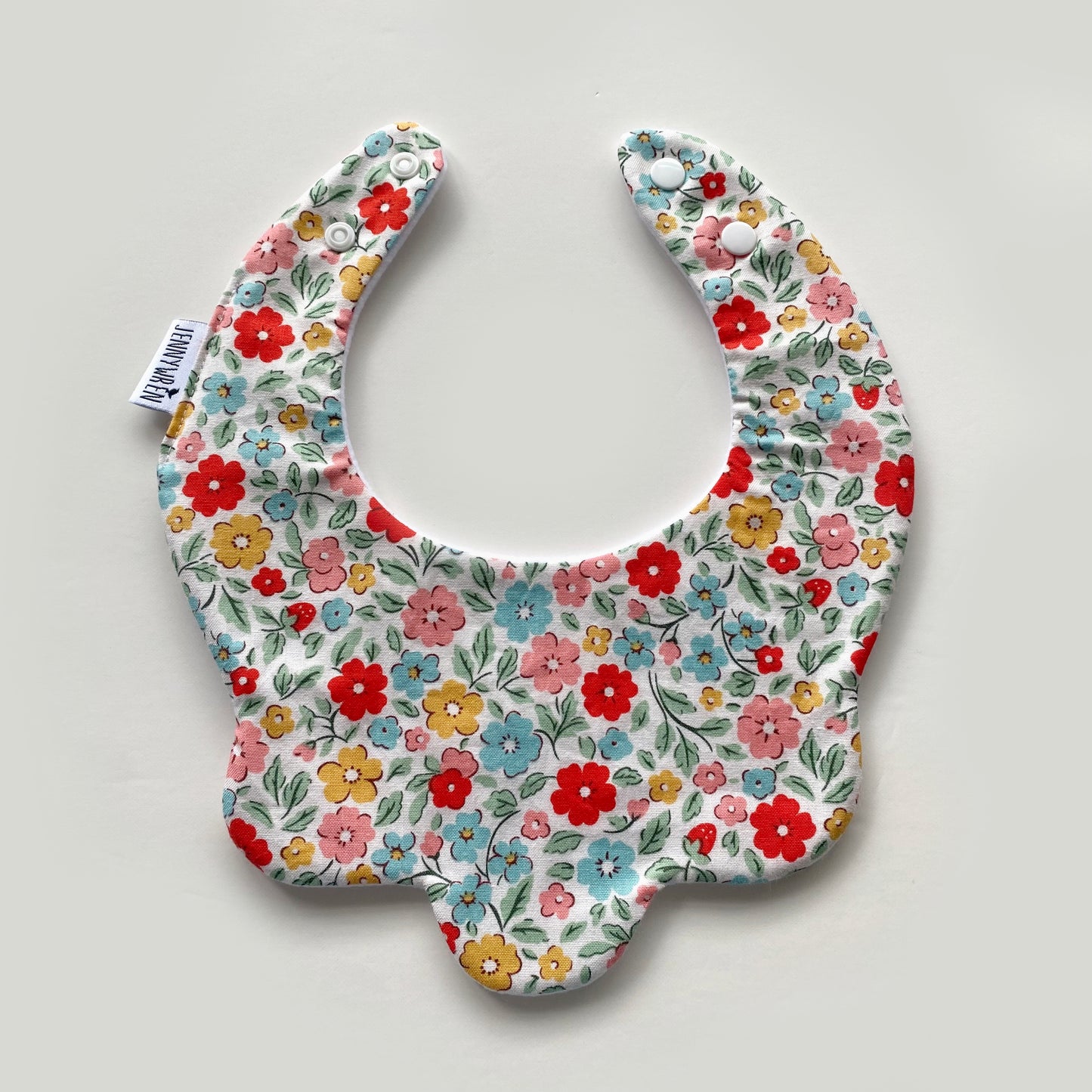 Rainbow floral scallop bib