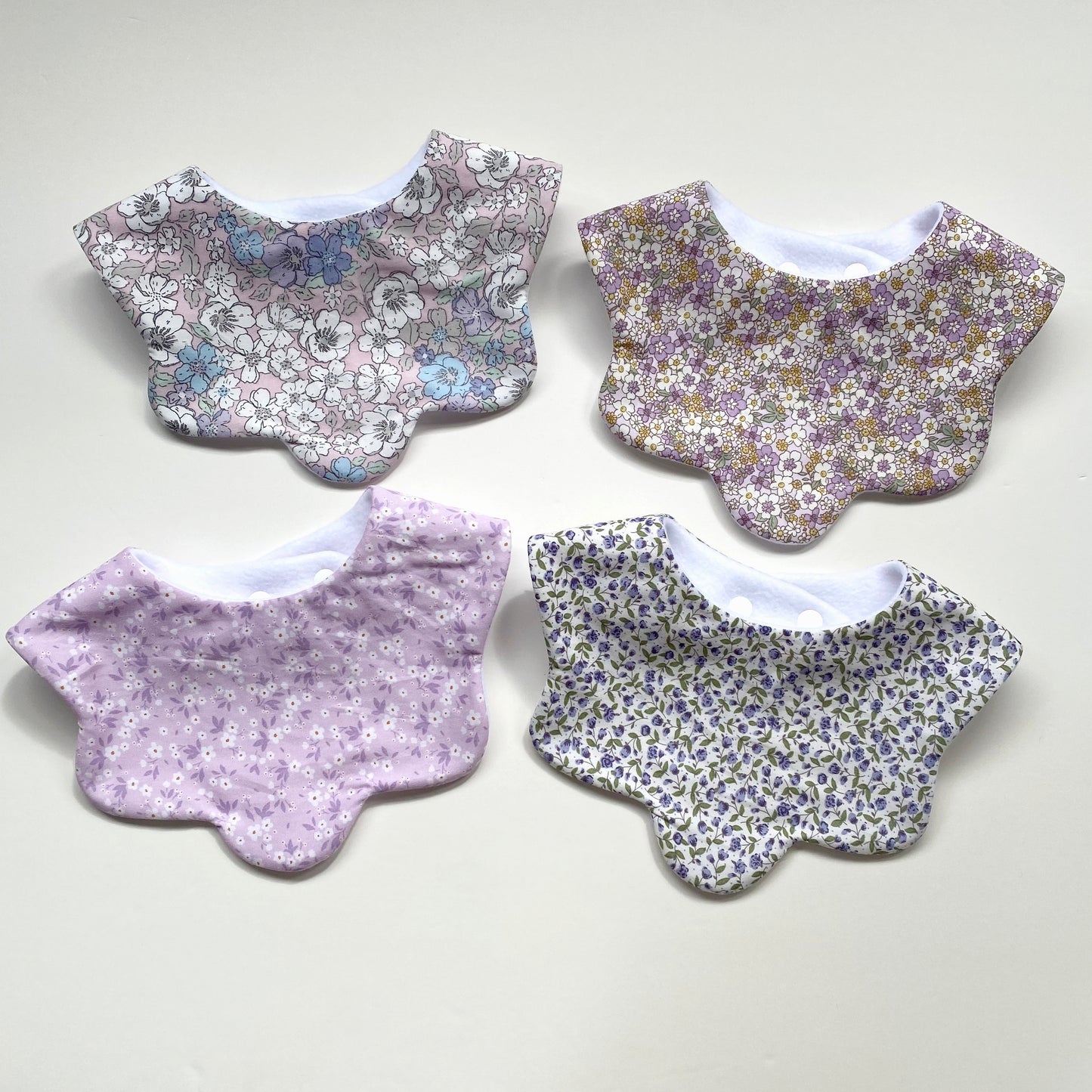 Choice of ditsy scallop bib