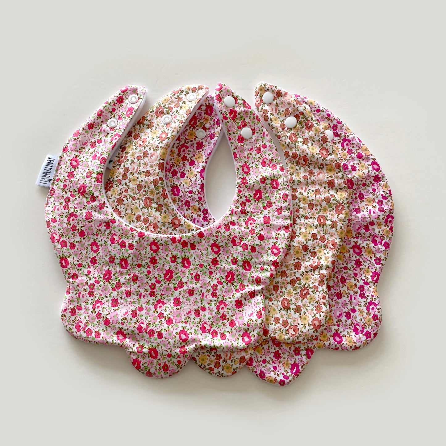 Choice of ditsy floral scallop bib