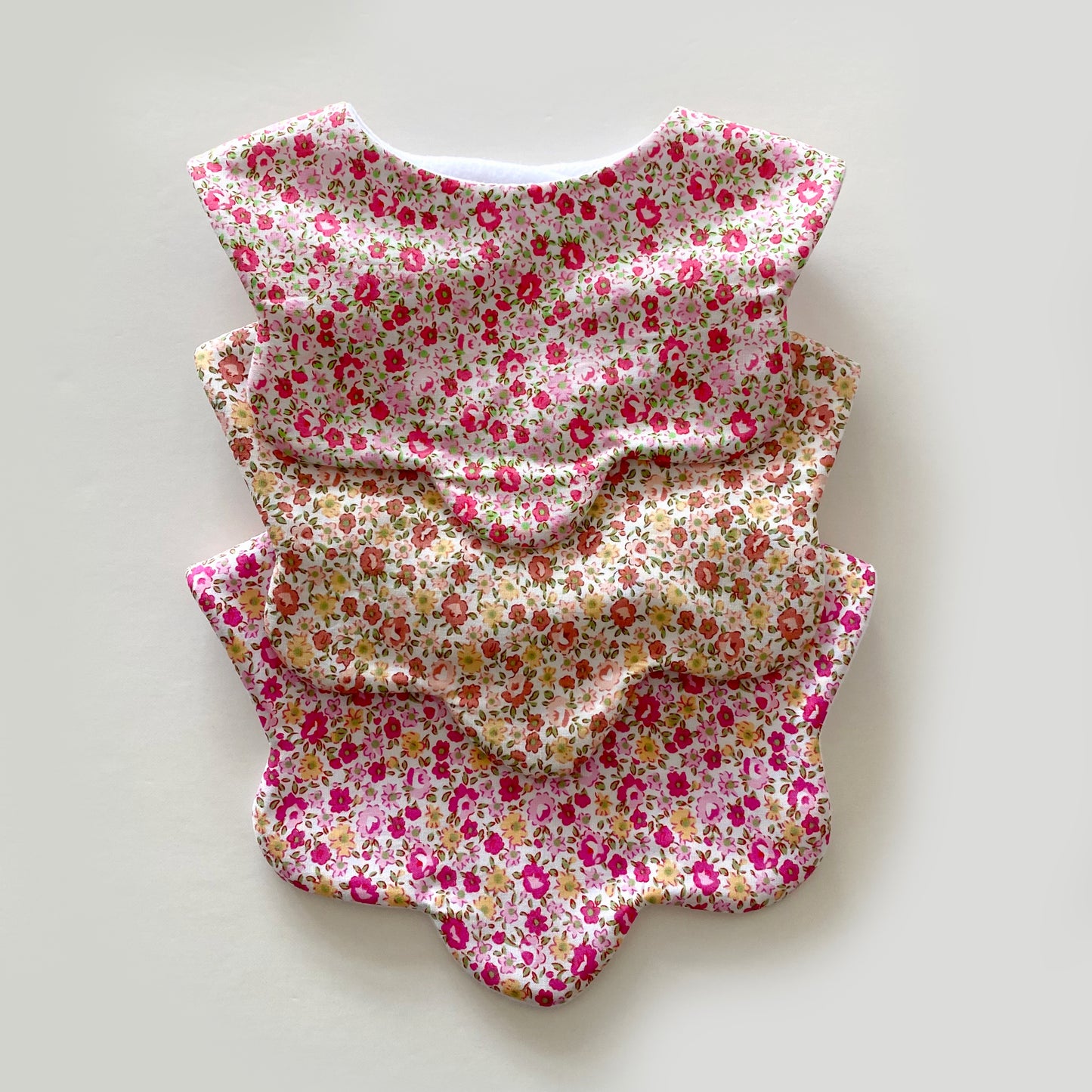 Choice of ditsy floral scallop bib