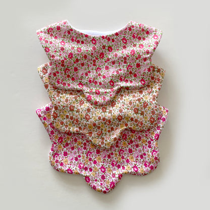 Choice of ditsy floral scallop bib