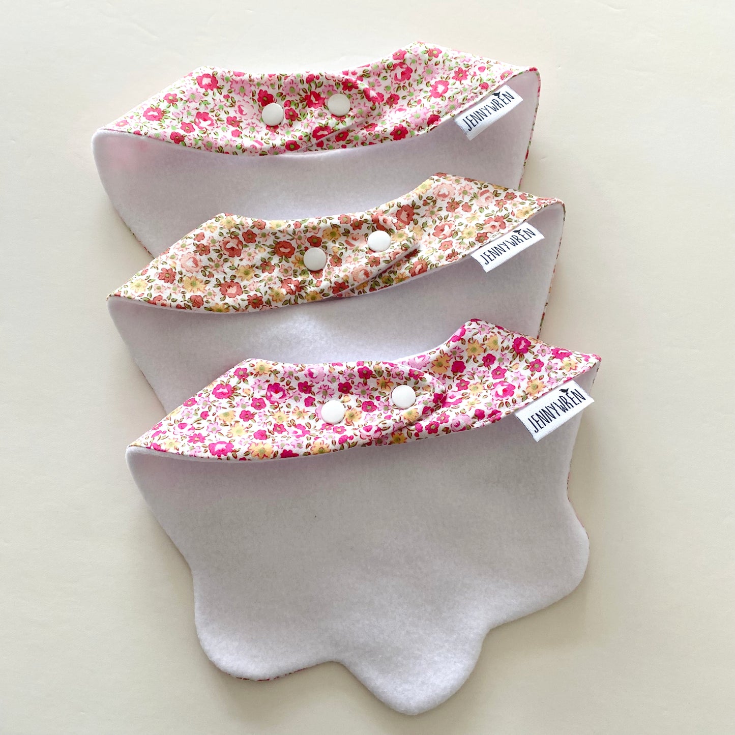 Choice of ditsy floral scallop bib