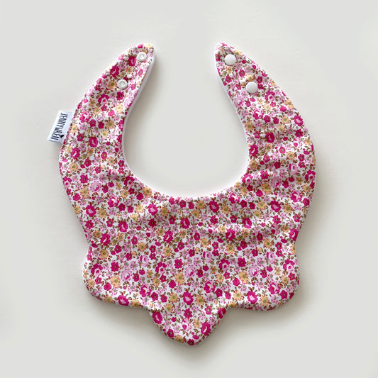 Fuchsia pink with yellow ditsy floral scallop bib